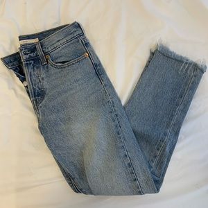 Levi’s straight leg high rise light wash wedgie jeans with raw hem